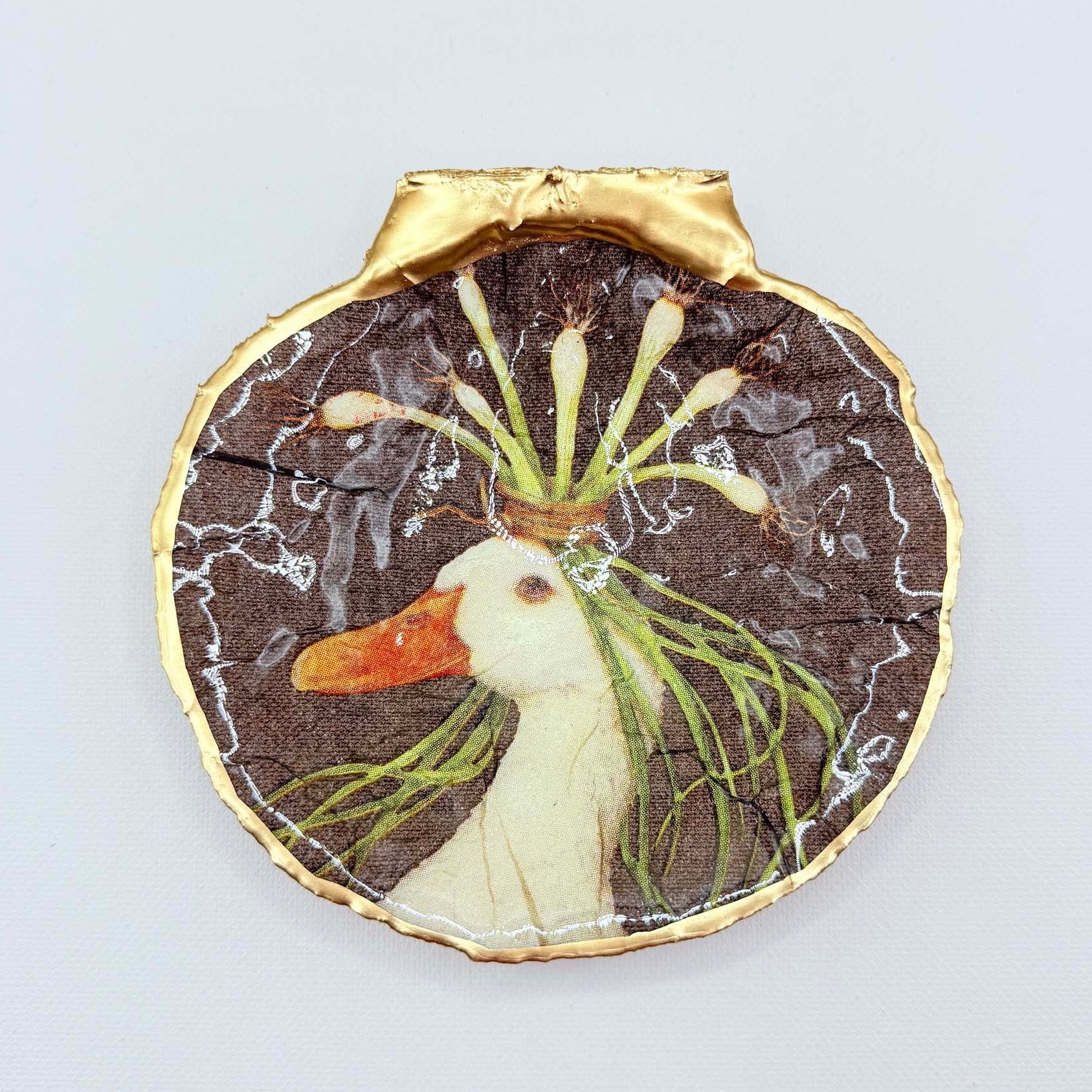 Decorative plate with a duck design on a white background