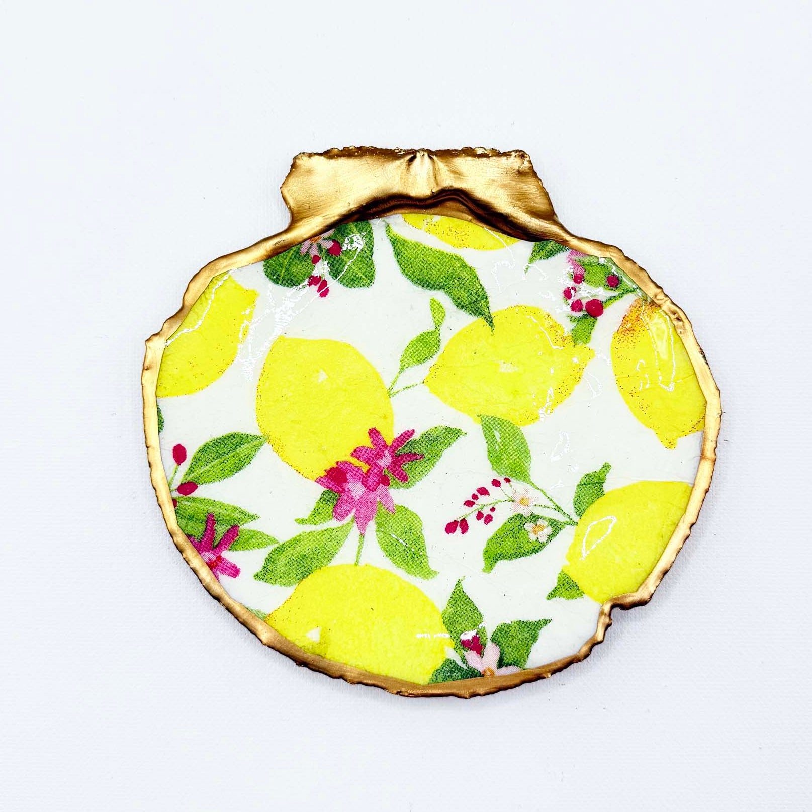 Decorative shell with lemon pattern on a white background