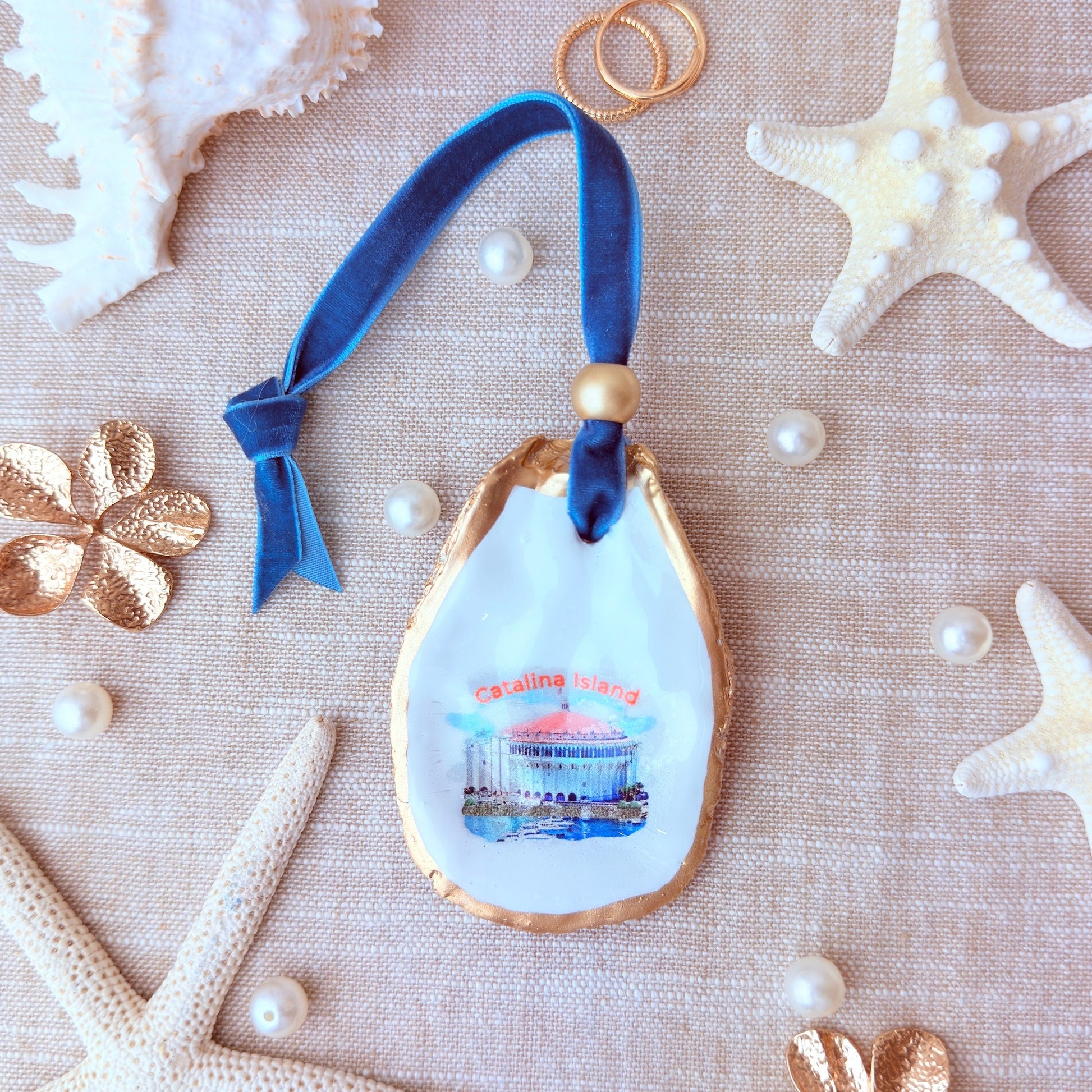 Catalina Island design on oyster seashell used as a christmas ornament